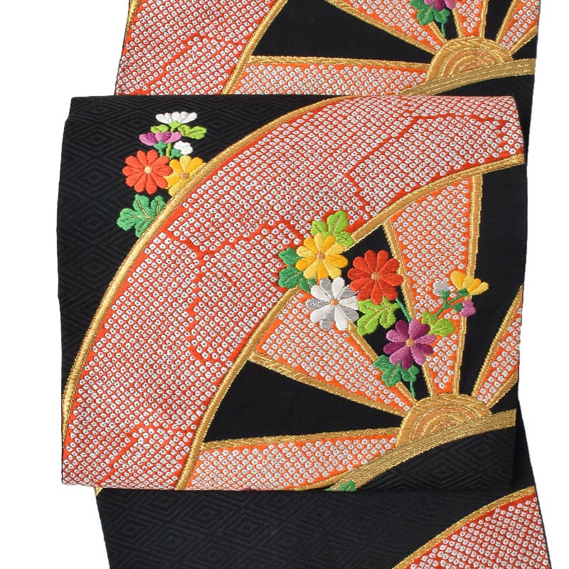 【中古品】仕立て上がり　袋帯 「黒地　菱形に源氏車」 唐織