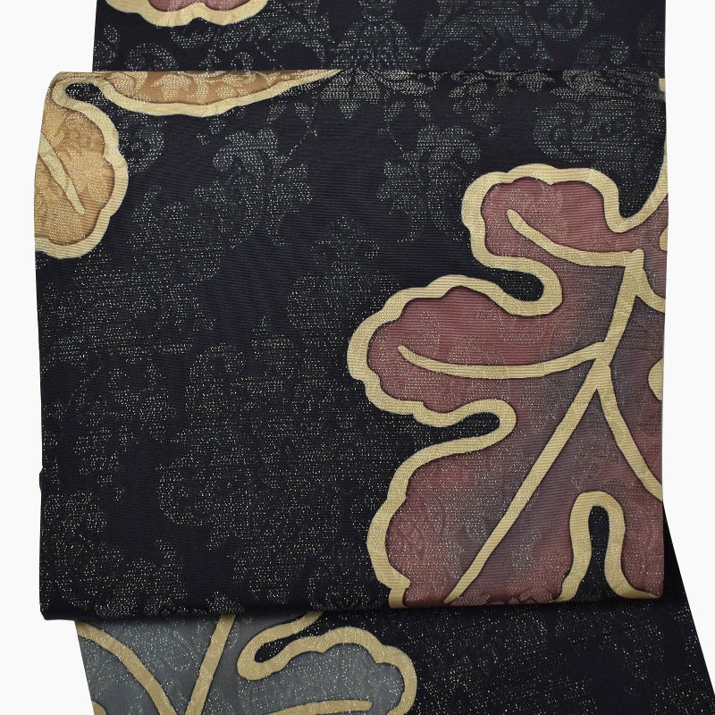 【中古品】仕立て上がり 袋帯 「黒地に柏葉とアラベスク調」 染帯 染め帯 洒落帯