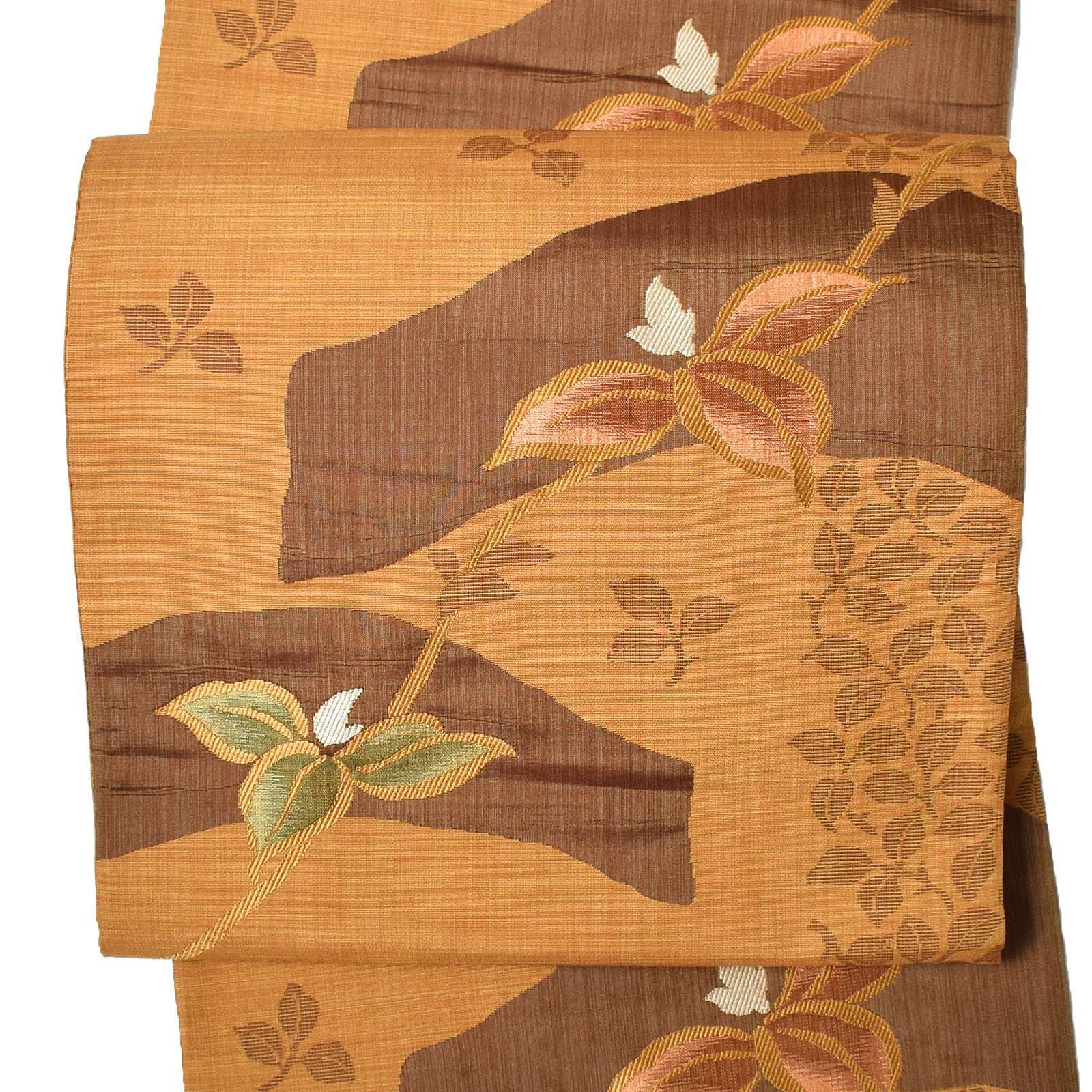 【中古品】仕立て上がり 袋帯 「赤朽葉色地　路に咲く草花」 洒落帯