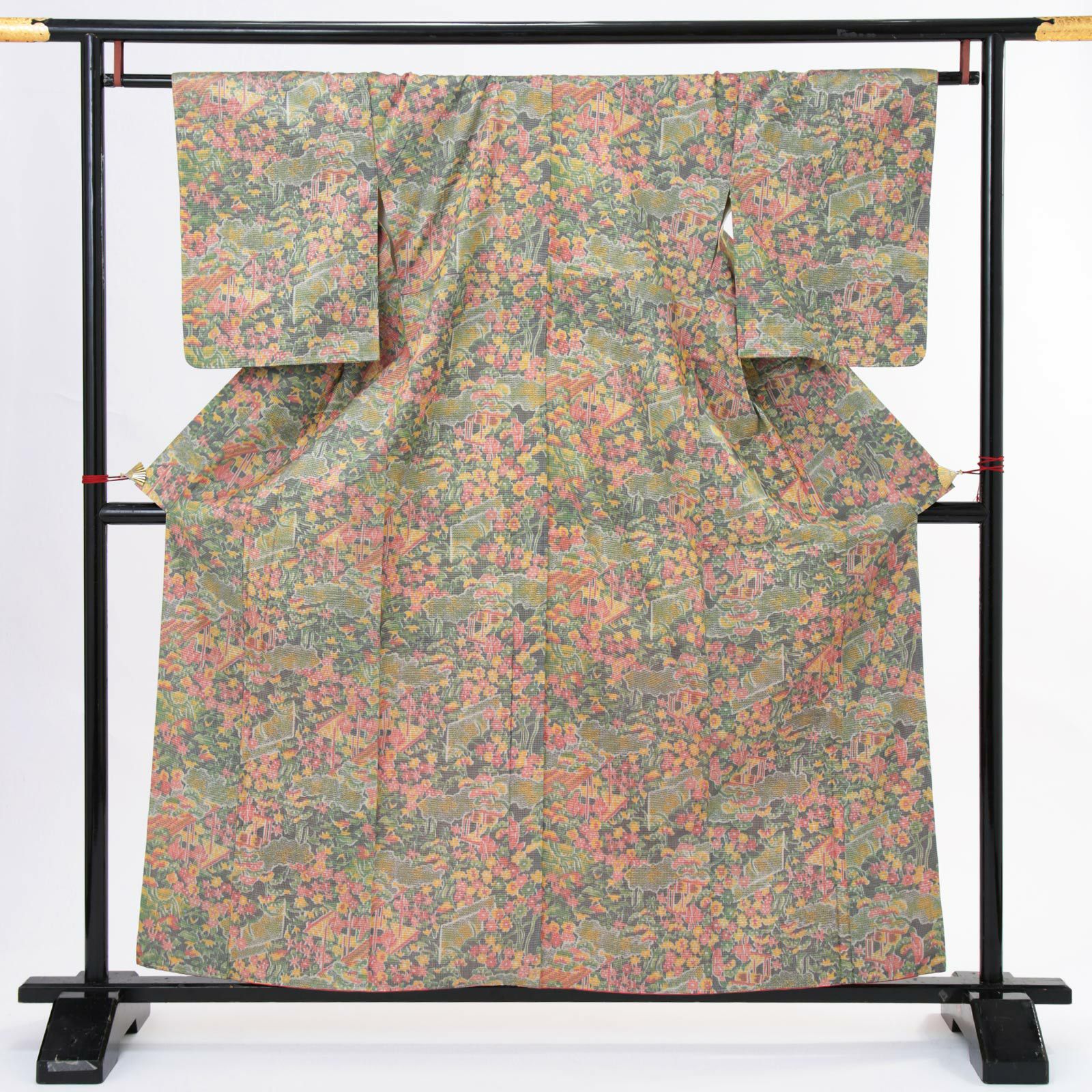 【中古品】仕立て上がり 色大島「グリーン系 御所解文様」小紋 正絹 紬